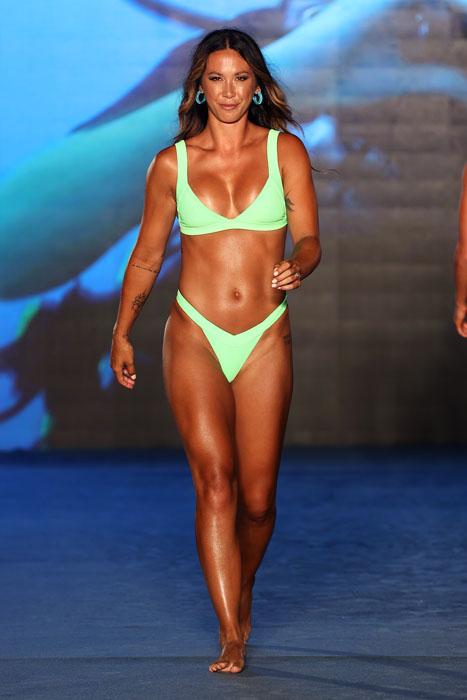 MIAMI, FLORIDA - JULY 10: Alex Aust walks for 2021 Sports Illustrated Swimsuit Runway Show during Paraiso Miami Beach at Mondrian South Beach on July 10, 2021 in Miami, Florida. (Photo by John Parra/Getty Images for Sports Illustrated)