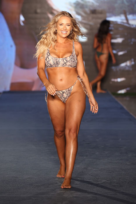 MIAMI, FLORIDA - JULY 10: Kristen Louelle walks for 2021 Sports Illustrated Swimsuit Runway Show during Paraiso Miami Beach at Mondrian South Beach on July 10, 2021 in Miami, Florida. (Photo by John Parra/Getty Images for Sports Illustrated)