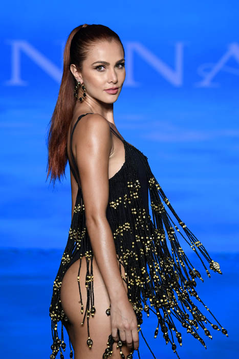 MIAMI BEACH, FLORIDA - JULY 08: Model and TV Host Kary Ramos walks the runway during the Giannina Azar show At Miami Swim Week Powered By Art Hearts Fashion at Faena Forum on July 08, 2021 in Miami Beach, Florida. (Photo by Arun Nevader/Getty Images for Art Hearts Fashion)