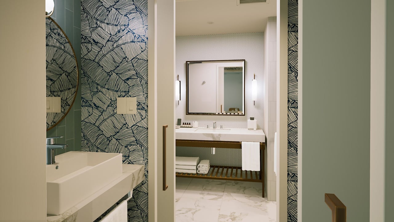 the-swan-reserve-suite-bath-and-pwdr-rm-16×9